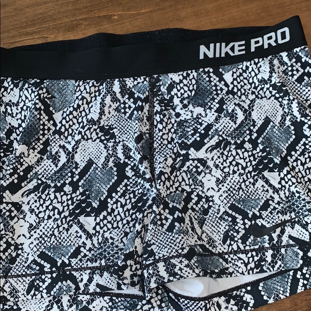 Women’s snake print Nike pros